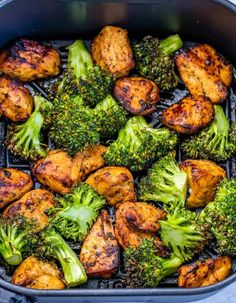 chicken and broccoli cooking in a pan