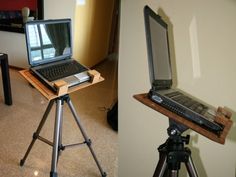 a laptop computer sitting on top of a wooden table next to a camera tripod