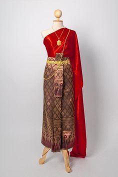 "This is Asian traditional dress is made from synthetic silk for top and skirt (adjust size by hook), length 36 inches. This dress set including with one sabai and one sarong . It is very unique and easy to wear. This item we have 2 type size. 1. Standard size Waist 23-30\" Hip max. 37 \" 2 Plus size Waist \" up to 42\" Hip up to 46\" Item not include jewelry, or accessory Note: - Each item may have very slight variances and imperfections due to the handmade process - The actual color may be sli Brocade Dress For Traditional Ceremonies, Brocade Dresses For Traditional Ceremonies With Traditional Drape, Traditional Ceremony Dress With Pallu, Traditional Sarong For Festivals, Lao Clothing, Traditional Thai Dress, Thai Traditional Clothing, Laos Clothing, Traditional Thai Clothing