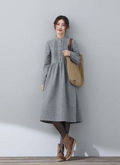 "FEATURES * 25% wool, other fiber,nylon * Polyester lining * Two side seam pockets * Front button closure * Long sleeve wool dress * Casual wool dress * Perfect for winter, autumn * Dry clean * Size XS-Sample is ready to ship, Only 1 available, don't accept refund, exchange * The model is 170 cm (5′ 7″) tall with a 80 cm (31.5\") bust, 66 cm (26\") waist. She is wearing the wool dress in size XS. ★★ Get your size in Size Chart with your body measurement https://www.etsy.com/listing/794055682 ★★ Winter Wool Dress, Dress Shirt Dress, Woolen Dresses, Body Measurement, Handmade Dress, Medieval Dress, Dress Handmade, Handmade Dresses, Formal Looks