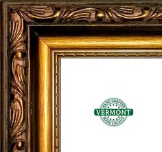 an ornate gold frame with a green vermont seal on the front and white background, is shown