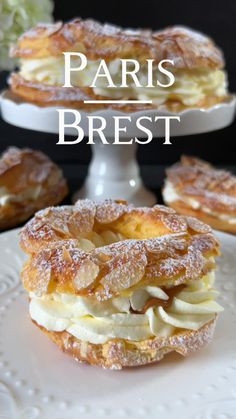 two desserts on white plates with the words paris brest in front of them