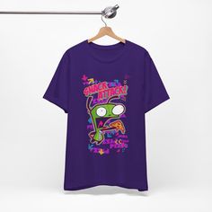 Unisex Scene Fashion Shirt - Invader Zim Vintage Tshirt - 2000'S Emo Hot Topic Style This classic unisex jersey short sleeve tee fits like a well-loved favorite. Soft cotton and quality print make users fall in love with it over and over again. These t-shirts have-ribbed knit collars to bolster shaping. The shoulders are tapered for a better fit over time. Dual side seams hold the garment's shape for longer.  .: Made with 100% Airlume combed and ring-spun cotton, a lightweight fabric (4.2 oz/yd² (142 g/m that is easy to layer, breathable. Perfect for active and leisure wear.  .: The retail fit that is perfect for casual and semi-formal settings. The crew neckline adds a classic, neat style that's perfect for accessorizing. .: Bella+Canvas manufactures all its products in the US and interna 90s Style Cotton T-shirt For Fan Merchandise, Pop Culture Short Sleeve T-shirt With Front Print, Pop Culture Front Print Short Sleeve T-shirt, Cotton Short Sleeve Shirt For Fan Merchandise, Retro Purple T-shirt With Graphic Print, Retro Short Sleeve Shirt With Front Print, Retro Purple Short Sleeve Top, Band Merch Shirt With Funny Print And Short Sleeves, Pop Culture Cotton Short Sleeve T-shirt