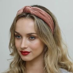 Indulge in a touch of luxury with the Velvet Turban Twist Knot Headband. This isn't just a headband; it's an accessory that spells grace and opulence. Crafted from 100% polyester, it feels as velvety soft as it looks. The twist knot is the pièce de résistance, adding that extra flair to elevate your hairstyle. This headband doesn't just adorn your head; it crowns you in style. Add this plush piece to your collection and let your customers experience the epitome of elegance. Colors: Black, Navy, Velvet Turban, Top Knot Headbands, Velvet Headband, Twist Knot, Twist Headband, Classy Chic, Velvet Tops, Blush Color, Knot Headband