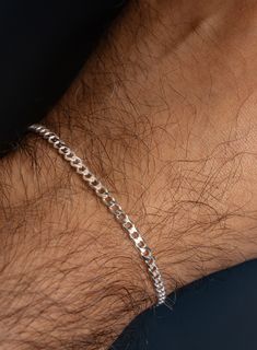 For the UBER MINIMALIST fella, we made this barely there, super lightweight 3mm cuban link chain bracelet. Love this style when paired with a colorful gemstone bead bracelet or with your silver watch. That said, we love it even more when it can have the spotlight and be the only jewelry you are wearing. Less is always more. Material: 925 Sterling Silver Bracelet Width: 3mm Clasp: Lobster Claw Available in 7, 8, 9 inches. If you need a custom or in-between size feel free to contact us to arrange Men’s Bracelet Chain Silver, Male Bracelets Aesthetic, Men Silver Bracelet Simple, Male Bracelets Silver, Male Jewelry Aesthetic, Mens Silver Bracelets, Male Bracelets, Mens Bracelet Designs, Male Jewelry