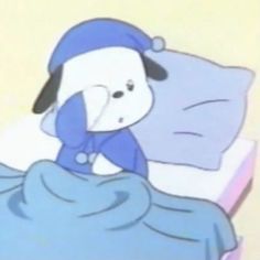 a cartoon character laying in bed with his head on the pillow