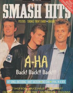 the cover of smash hits magazine with two men standing next to each other and smiling