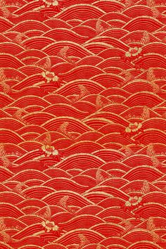 a red and gold wallpaper with wavy lines on it's surface, in the shape of waves