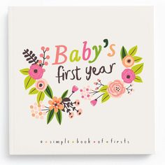 a baby's first year book with flowers on it