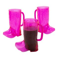 Cowgirl enthusiasts can't get enough of these boot-shaped mugs! A great drinkware option or favor for themed birthday parties or bachelorette getaways, these cups are made from BPA-free plastic and can be used again and again. Use the mugs to serve up your favorite beverages from the Wild West or stuff them with candy and small favors to create fun party gifts. Plastic. 6 1/2" 17 oz. Hand wash only. Not recommended for microwave use. © OTC Cowgirl Party Favors, Pink Cowgirl Boot, Pink Cowboy Boots, Pink Cowgirl Boots, Western Theme Party, Plastic Mugs, Pink Cowgirl, Cowgirl Party, Cowgirl Boot