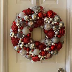 Beautiful festive bulb wreath.  One of a kind ready to display. Reds, white, and silver.  Sparkly and shiny!  I love this one! Red And Silver Bauble Wreath, Ornament Wreath Diy, Bulb Wreath, Holiday Deco, Christmas Table Centerpieces, Valentines Crafts, Diy Wreaths, Wreath Crafts, Beautiful Wreath