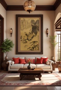 a living room filled with furniture and a painting hanging on the wall above it's windows