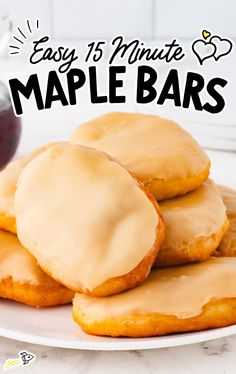 easy 15 minute maple bars with frosting on a white plate next to a glass of wine