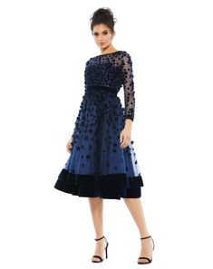 Elegant tea-length cocktail dress with semi-sheer yoke and sleeves, tulle overlay skirt, and intricate velvet floral accents and beading throughout. Mac Duggal Fully Lined Back Zipper 100% Polyester Long Sleeve Tea Length Sweetheart Neckline with Boat Neck Mesh Overlay Style #67007