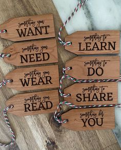 four wooden signs that say, do something you want to learn