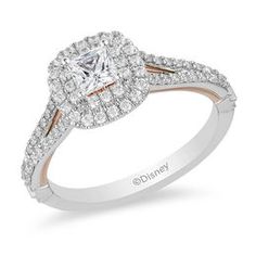 a diamond engagement ring with two tone gold and white diamonds