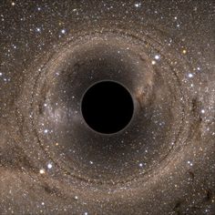 a black hole in the center of a star filled sky