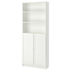 a white bookcase with two doors and shelves