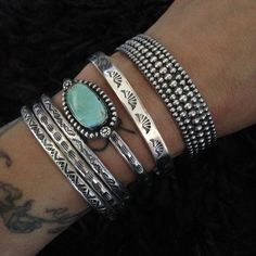 "These solid sterling silver stacker cuffs come in a set of three. They are hand stamped with geometric designs. The bracelets are then oxidized (darkened) and polished to bring out the stamping. These rustic cuffs are sturdy and comfortable to wear. The cuffs are each 4mm thick, and are 5.5\" wide with an adjustable 1\" opening. They will fit most small and medium wrists, and can be adjusted to fit by squeezing or stretching the sides. This ships in a gift box! I can also sell individual cuffs- Turquoise Jewelry Aesthetic, Western Type, Turquoise Jewelry Western, Turquoise Jewelry Rings, Western Fashion Jewelry, Turquoise Accessories, Rodeo Jewelry, Western Bracelets, Cowgirl Accessories