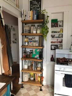 a kitchen filled with lots of different types of cooking utensils and other items