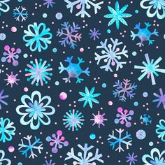 blue and pink snowflakes on a black background with polka dot dots in the middle