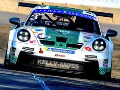 a porsche racing car driving on a race track