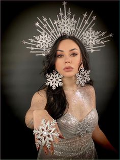 Festive silver halo crown with snowflakes. It will be a great addition to a festive outfit for a Christmas party or New Year's celebration. Will be a great addition to winter photography. The height of the composition is 6,9 inches. The size of the product is adjustable using an elastic band that connects the sides of the headband. 100% designed and handmade by our designers ( SETA Design studio in Kyiv). It will be securely packed in a box. Feel free to contact us if you have any questions. We accept returns only if the product is delivered to the buyer in a damaged condition. The buyer must contact us on the day of receiving the parcel and provide photos confirming the damage to the product. We do not accept order cancellations if the product has already been sent to the buyer. For all c Christmas Headdress, Bride Winter, Christmas Headpiece, Christmas Party Accessories, Fairy Headpiece, Crown Bride, Belly Dancer Costumes, Spring Portraits, Holiday Makeup Looks