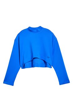 An oversized mock-neck sweatshirt features moisture-wicking Dri-FIT techology that keeps you comfy, while a cropped length creates a cool, modern look. 15 1/2" front length; 18" back length (size Medium) Mock neck 93% polyester, 7% spandex Machine wash, tumble dry Imported Sports Top With Relaxed Fit And Funnel Neck, Functional Funnel Neck Tops For Fall, Oversized Functional Sweatshirt For Fall, Functional Fall Tops With Funnel Neck, Nike Athleisure Sweatshirt For Spring, Casual Workout Tops With Funnel Neck, Spring Sporty Funnel Neck Sweatshirt, Sporty Funnel Neck Top With Ribbed Cuffs, Sporty Top With Funnel Neck And Ribbed Cuffs