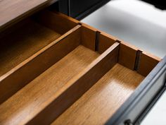 an open drawer is shown in this image