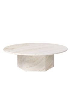 a white marble table with an octagonal base