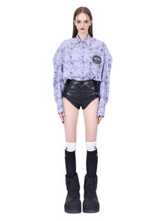 Relaxed fit button-up shirt in soft lavender tie-dye pattern. Features long sleeves and a chest pocket with a small embroidered detail. Trendy oversized silhouette perfect for casual, streetwear-inspired looks. Ideal for layering or wearing as a lightweight jacket. Model info Height: 175cm Wearing size：M