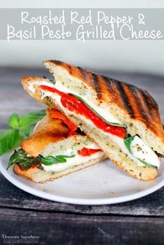 grilled red pepper and basil pesto grilled cheese sandwich on a white plate