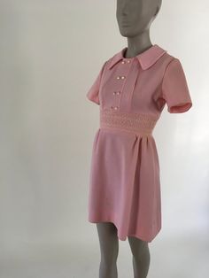 Vintage 1970's Pink Polyester Girl's Peasant Mini Dress, Size XS Pink Mini Vintage Dress For Summer, Pink Mini Length Vintage Dress For Summer, Vintage Pink A-line Dress, Pink Mini Vintage Dress For Spring, Retro Pink A-line Mini Dress, Vintage Pink Mini Length Dress, Vintage Pink Knee-length Dress, Vintage Knee-length Pink Dress, Pink Vintage Knee-length Dress