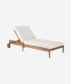 an outdoor chaise lounge chair with wheels on the bottom and back, made out of wood