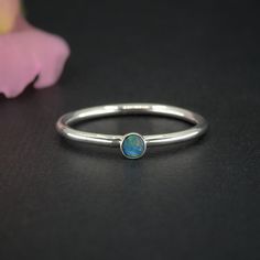 This listing is for a dainty Australian Opal ring, crafted by hand especially for you. To order, simply select your ring size from the drop-down menu. I will then intuitively choose a piece of blue Australian Opal just for you, using the specifications from your order to create your very own custom ring. Like all my work, each piece is individually made, using recycled silver, cruelty-free materials, ethically sourced gemstones and environmentally friendly  methods. ♥ Handcrafted: ⦁ Made to Orde Opal Stacking Ring, Australian Opal Ring, Blue Opal Ring, Coober Pedy, Custom Ring, Protection Stones, Recycled Silver, Opal Ring, Australian Opal