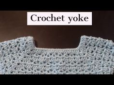 the crochet yoke has been made with yarn