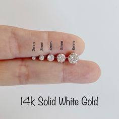 "Listing is a PAIR 14K Solid WHTE Gold Tiny Clear CZ Stud Earrings 14K Solid Gold including earring backs Cubic size: 2mm / 3mm / 4mm / 5mm / 6mm / 7mm / 8mm - Suitable for delicate and sensitive ears - 14k Solid buttery backs - Post Length: 10mm - Comes in a Gift box. WE CAREFULLY INSPECT ALL OF MY PIECES BEFORE THEY LEAVE THE STUDIO. IF EVER AN ITEM ARRIVES DAMAGED, IT MUST BE REPORTED TO ME IMMEDIATELY- WITHIN 24HRS AFTER DELIVERY. We take all responsibility of BROKEN ITEMS in 5 DAYS AFTER DE White Gold Studs, Tiny Earrings, Cz Stud Earrings, Gold Stud, Keep Jewelry, Screw Back Earrings, Gold Studs, Earring Backs, Metal Stamping