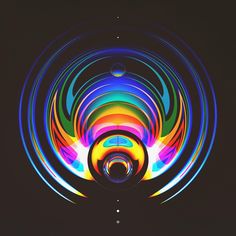 an image of colorful circles in the dark