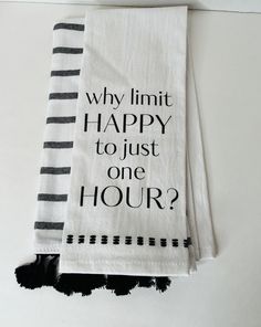 two tea towels with black and white designs on them that say, why limit happy to just one hour?