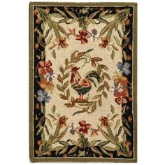 an area rug with flowers and leaves on the border in black, red, white and green colors