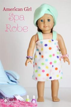 the american girl doll is wearing a polka dot romper and pink hat with green hair