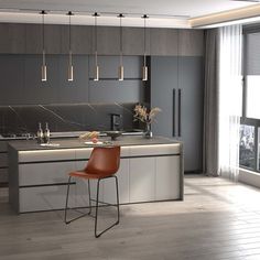 a modern kitchen with an island and bar stools