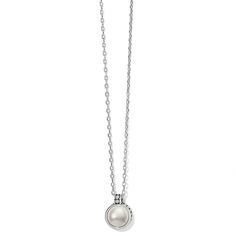 This forever classic necklace dangles a fine crystal pearl capped with Balinese pebble and dot textures. Pebble Color, Dot Texture, Silver Cleaner, Classic Necklace, Handbag Charms, Cabochon Pendant, Short Necklace, Jewelry Cleaner, Pearl Color