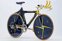 a bike with yellow and black rims on it