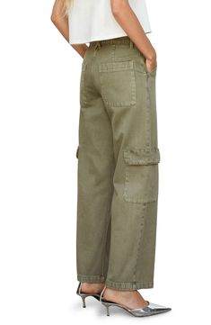 An earthy wash adds unmistakable appeal to nonstretch-denim jeans outfitted with wide legs and adventure-ready cargo pockets. 30 1/2" inseam Zip fly with button closure Front slant pockets; back patch pockets; cargo flap-patch pocket 100% cotton Machine wash, line dry Imported Womens Green Cargo Pants Outfit, Green Cotton Pants, Green Cargo Pants Outfit, Colored Pants Outfits, Denim Jeans Outfit, Green Cargo Pants, Cargo Pants Outfit, Colored Pants, Cargo Pants Women