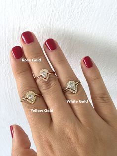 a woman's hand with three different rings on it and the words rose gold, yellow gold, white gold