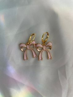 The cutest enamel bow earrings! Go perfect with any outfit and are comfortable to wear! Our hoops are gold plated and hypoallergenic for your comfort! Preppy Jewelry, Bracelets Ideas, Coquette Bow, Jewelry Accessories Ideas, Girly Accessories, Jewelry Essentials, Jewelry Lookbook, Bow Earrings, Girly Jewelry