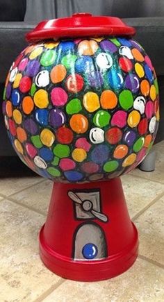 a brightly colored gummy machine sitting on the floor