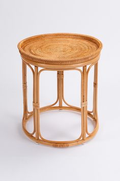 a round wicker table on white background