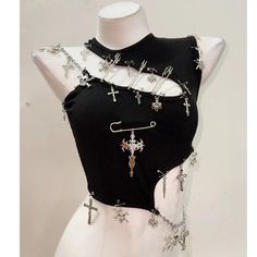 Gothic Chained Tank Top – Unleash Your Dark Elegance 🖤⛓️  Elevate your alternative wardrobe with the Gothic Chained Tank Top, a daring fusion of dark aesthetics and fierce fashion. With its sleek design and eye-catching chain details, this top is perfect for those who love to embrace their gothic side while staying effortlessly cool. Whether you're heading to a concert, a night out, or just want to make a bold statement, this tank top will have you looking both edgy and chic. 🌑✨ Tank Tops Y2k, Punk Tank Top, Gothic Tank Tops, Fest Outfits, Drawing Face, Skull Tank, Gothic Clothes, Face Expressions, Gothic Outfits